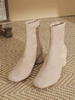 Bottines abricot en daim à bout carré et talon épais