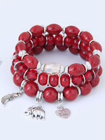 Bracelet à rangée fabuleux en résine bohémien ornement métallique
