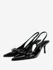 Chaussures habillées noires à talons hauts avec nœuds et bride arrière à talons aiguilles