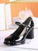 Chaussures vintage en cuir verni noir à bout rond à lacets