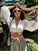 Chemisier femmes blanc à lacets col en v Chic manches longues Polyester top sexy