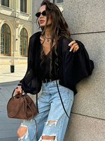Chemisier noir surdimensionné avec détail de cravate col en V manches raglan longues lanternes hauts transparents décontractés pour femmes 2025