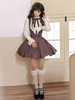 Chemisiers gothiques Lolita écrus blancs manches longues nœuds volants Lolita Top Lolita chemise Lolita