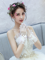 Gants de mariage Longueur du poignet Tulle Volants Fleurs Gants de mariée