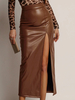 Jupe en similicuir avec fente latérale taille haute couleur unie jupe mi-longue chic en PU pour femme 2025