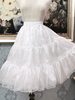 Jupons Lolita en polyester jupe Lolita blanche à plusieurs niveaux