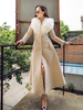 Manteau dhiver long avec col en plumes et poches matelassées