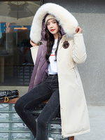 Manteau Matelassé Chaud comme Doudoune Femme Hiver Long avec Capuche Fausse Fourrure Synthétique avec Poches Coupe Légèrement Cintrée avec Badges Manteau Hiver Femme