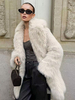 Manteau mi-long en fausse fourrure blanche à revers crantés Veste longue d