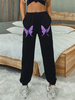 Pantalon Pantalon à taille haute en polyester noir à imprimé animal