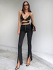 Pantalon Pantalon fuselé taille haute irrégulière en polyester noir fendu sur le devant