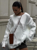 Pulls pour femmes pulls blancs à franges et col bijou sans manches en polyester