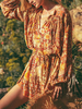 Robe bohème à col en V à manches longues et imprimé floral