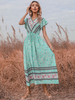 Robe bohème plissée col en V manches courtes imprimé floral robe dété superposée