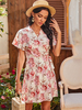Robe dété blanche col en V manches courtes imprimé floral à lacets robe de plage surdimensionnée au genou