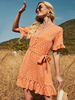 Robe dété orange col en V manches courtes volants imprimé polyester robe de plage mi-longue