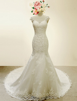 Robe de mariage sirène ivoire avec dentelle col rond avec traîne