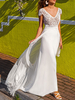 Robe de mariée bohème col V manche longue dos en V avec des boutons au sol