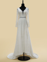 Robe de mariée bohème en dentelle découpée avec traîne taille naturelle dos nu manches longues col en V ivoire