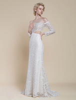 Robe de mariée bohème en dentelle sirène avec traîne taille naturelle fermeture éclair manches longues col bateau ivoire