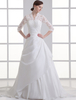 Robe de mariée boule ivoire en taffetas avec col V à traîne courte
