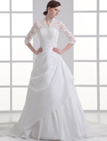Robe de mariée boule ivoire en taffetas avec col V à traîne courte
