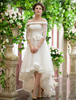 Robe de mariée coupe asymétrique