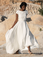 Robe de mariée deux pièces en mousseline de soie col bijou deux pièces longueur au sol fermeture éclair manches courtes ivoire