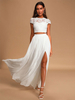 Robe de mariée deux pièces ivoire haut en dentelle col rond manche courte jupe en tulle