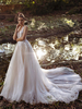 Robe de mariée en dentelle col V dos nu jupe pailleté à traîne
