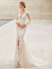 Robe de mariée en dentelle col V manche longue jupe fendue à traîne