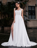 Robe de mariée en dentelles transparentes des fleurs creusantes dos nu à lacets coupe cintrée jupe évasée fente latérale robe mariée