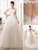 Robe de mariée en tulle ivoire à col bateau traîne chapelle