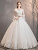 Robe de mariée pirncesse ivoire col bateau laçage sur dos manche longue au sol robe de mariage