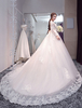 Robe de mariée princesse ivoire en tulle col rond manche longue en dentelle à traîne robe de mariage