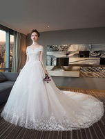 Robe de mariée princesse ivoire en tulle hors de l\