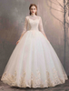 Robe de mariée princesse ivoire en tulle manche longue laçage sur dos à traîne ronde robe de mariage