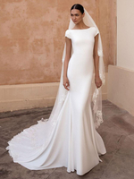 Robe de mariée sirène col bateau manche courte dos nu décoré des boutons