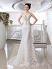 Robe de mariée sirène en dentelle ivoire avec perles à traîne