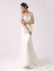 Robe de mariée sirène en dentelle ivoire hors de l