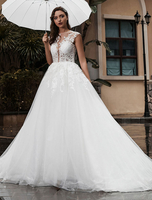 Robe de mariée trapèze blanche en tulle col rond boutonné sur dos à traîne robe de mariage