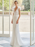 Robe de mariée vintage blanche ne dentelle et perles Col V profond dos nu à traîne décoré de plume Robe de mariage