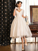 Robe de mariée vintage col V manche courte zip sur dos