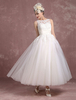 Robe de mariée vintage robe de mariage rétro ivoire col bateau en dentelle noeud sur dos jupe plissée longueur mollet