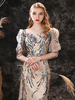 Robe de sorée or claire en dentelle col rond demi-manche paillete longueur au sol