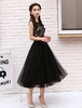 Robe fête de la rentrée A-ligne en tulle noir col rond brodé longueur mollet