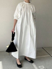 Robe longue blanche à manches longues et col rond en polyester