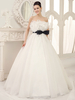 Robe mariage en organza ivoire à volants bustier longueur plancher