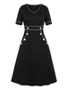 Robe noire vintage des années 1950 à boutons à manches courtes à col en V