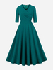 Robe rétro verte des années 1950 style Audrey Hepburn nœuds irréguliers demi-manches col en V robe rockabilly moyenne